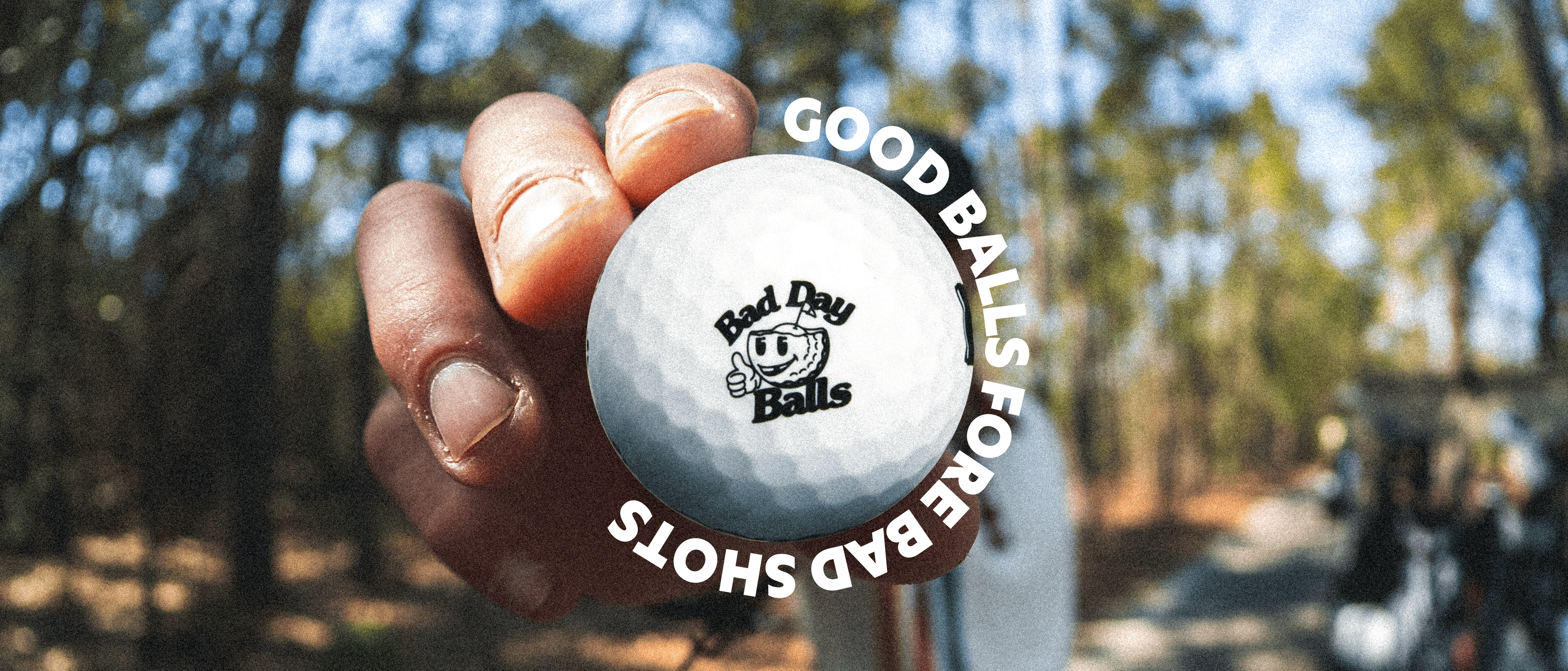 Bad Day Balls golf ball in hand on course