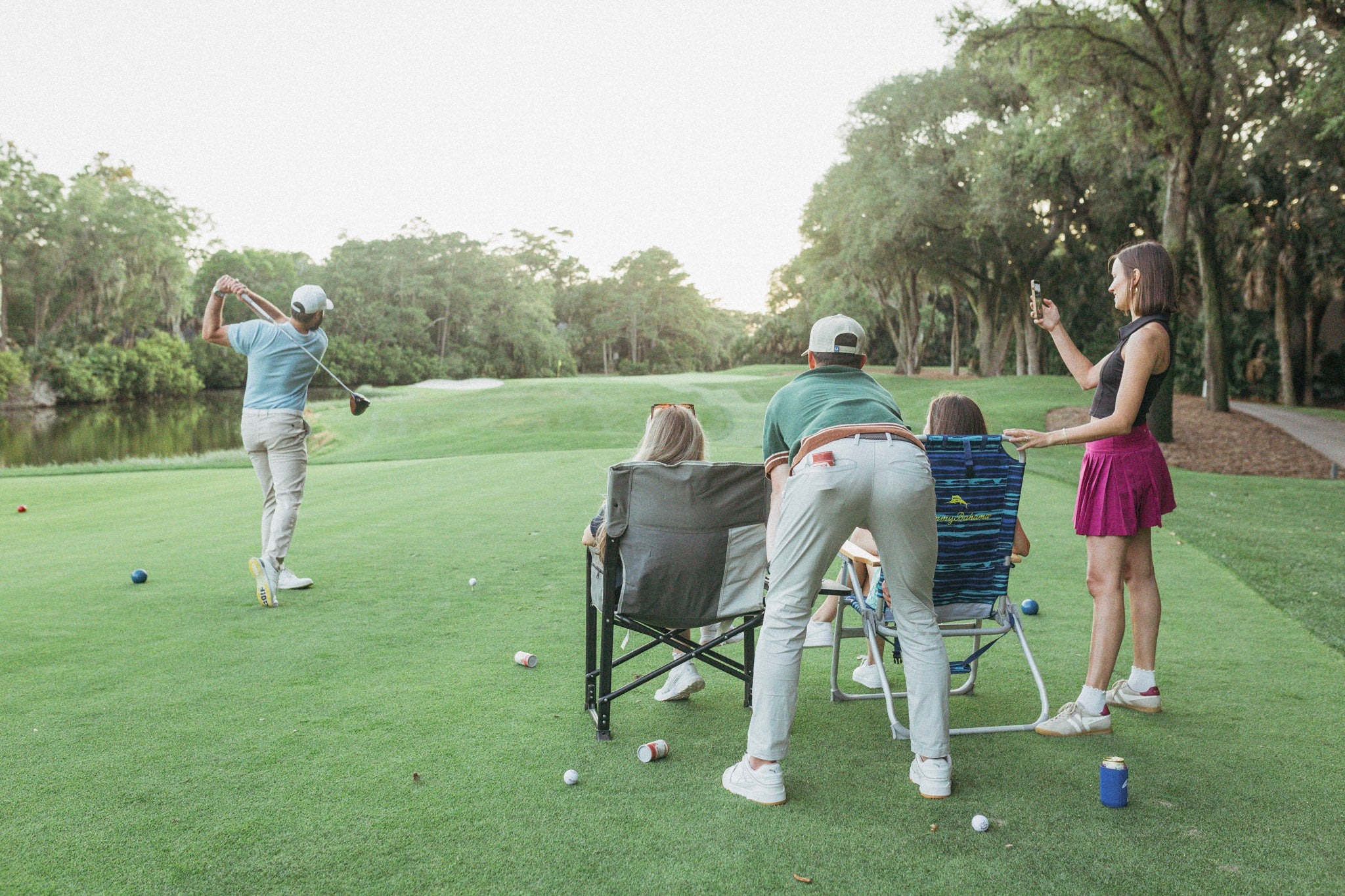 Ladies watching a pro hit bad day balls 